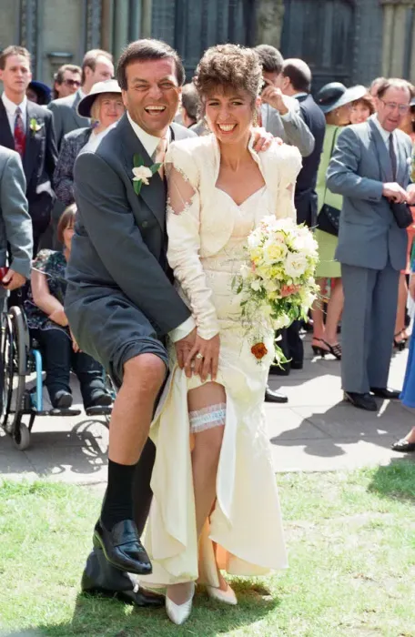 Framed Print : The wedding of Tony Blackburn and Debbie Thomson held at St Margarets Church
