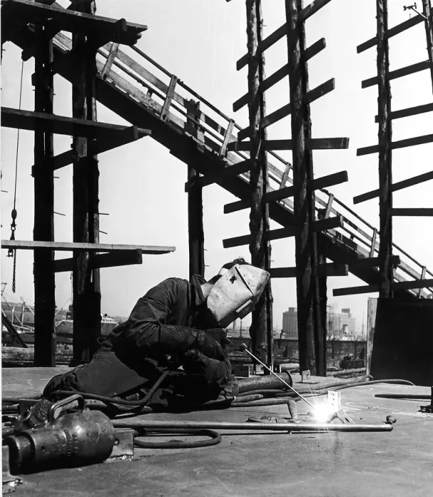 Framed Print : A welder puts together sectons of a ship in the Scottish shipyard Circa 1955 Framed Print : A welder puts together sectons of a ship in the Scottish shipyard Circa 1955