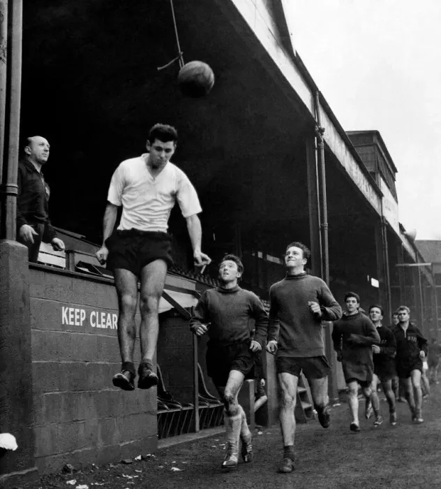 Framed Print : Welsh footballer Mel Nurse goes up for the ball during heading practice Framed Print : Welsh footballer Mel Nurse goes up for the ball during heading practice