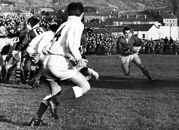 Welsh rugby at Treorchy, Reds forward Haydn Morgan makes a break with the ball