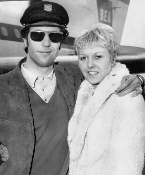 Welsh singing star Tom Jones pictured with his wife Linda after arriving from France