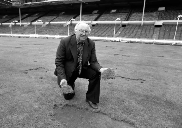 Framed Print : Wembley groundsman Don Gallacher inspects the damage cause by the Scottish fans following