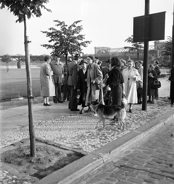 West Berlin 1953. Berliner of the Eastern sector being advised by the West Police not to