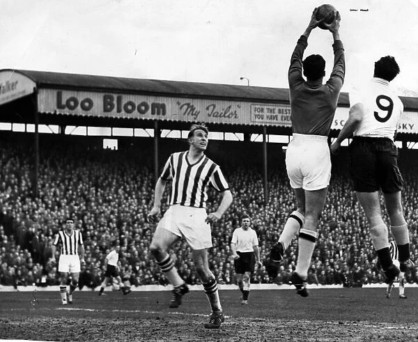 West Brom footballer Ray Barlow watches goalkeeper in action during a league match