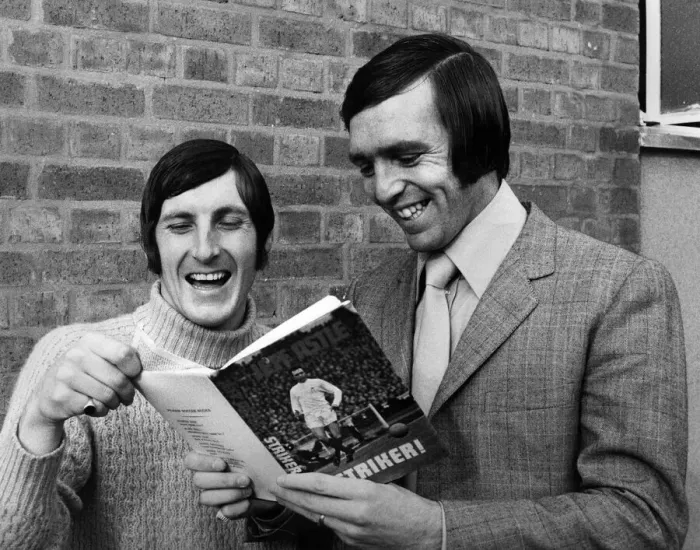Framed Print : West Bromwich Albion players Jeff Astle and Tony Brown look through Jeff Astle Framed Print : West Bromwich Albion players Jeff Astle and Tony Brown look through Jeff Astle