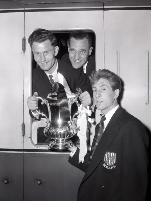 Framed Print : West Bromwich Albion Players on the the train with the FA Cup trophy as they leave London Framed Print : West Bromwich Albion Players on the the train with the FA Cup trophy as they leave London