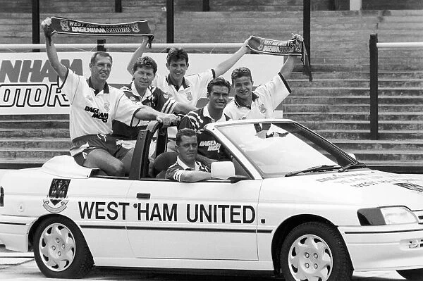 West Ham footballer Julian Dicks takes the driving seat as the West Ham team announce