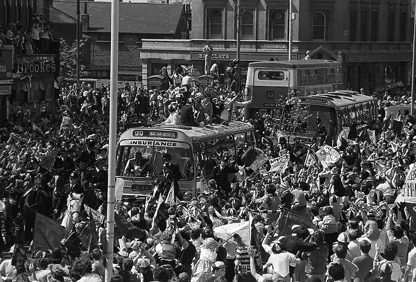 West Ham team Parade the FA Cup through the East End streets of London on their way to