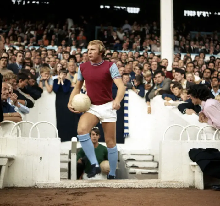 Framed Print : West Ham United captain leads out his team at Upton Park before the League Division One Framed Print : West Ham United captain leads out his team at Upton Park before the League Division One