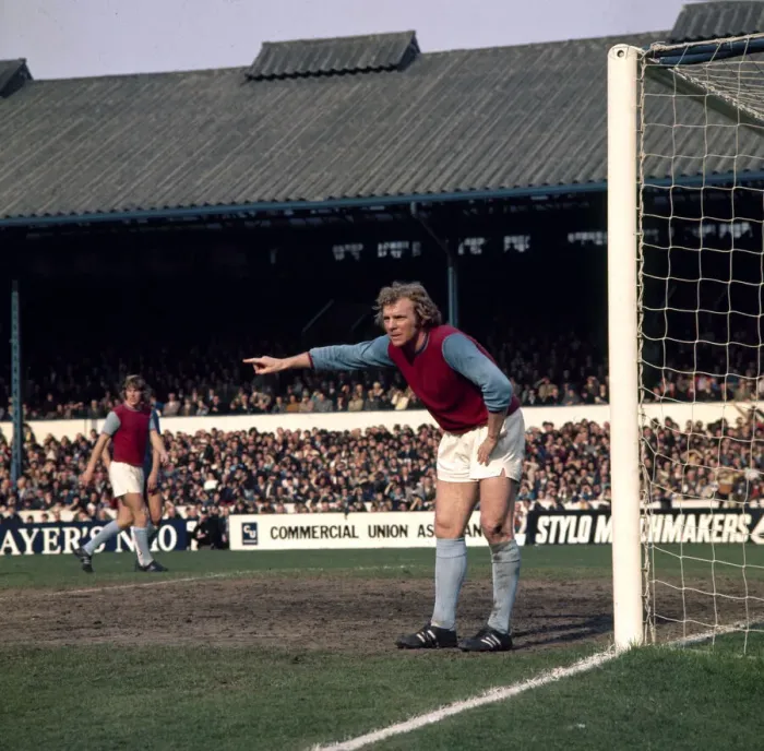 Framed Print : West Ham United footballer Bobby Moore shouts instructions to teammates during the league