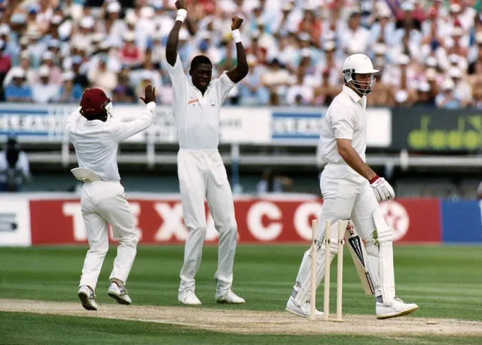 Framed Print : West Indies bowler Curtly Ambrose celebrates after taking the wicket of England batsman