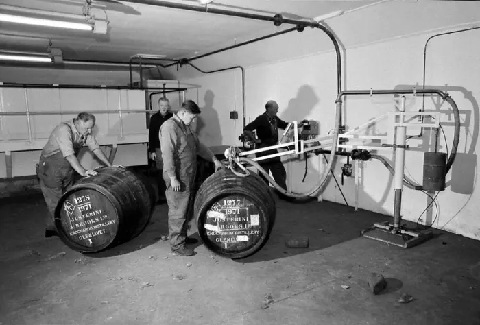 Framed Print : Whisky being filled in Sherry casks at the Knockando Whisky Distillery January 1972