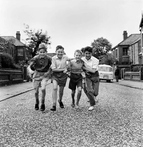 Whit Walks Manchester A group of young lads seen here in their neighbourhood before