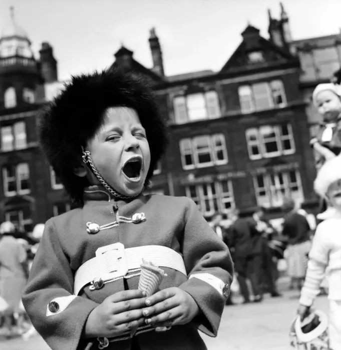 Framed Print : Whit Walks Manchester. June 1960 M4383-012A young boy dressed as a soldier enjoys his Ice