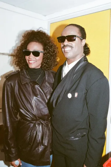 Framed Print : Whitney Houston and Stevie Wonder smile for a photograph backstage at the Nelson Mandela Framed Print : Whitney Houston and Stevie Wonder smile for a photograph backstage at the Nelson Mandela