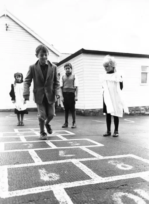Framed Print : Whittonstall Fist School pupils play hopscotch as part of their 75th anniversary