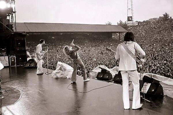 The Who in Concert - May 1976 Roger Daltrey on stage singing at the Charlton