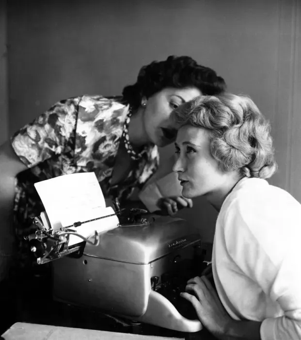 Framed Print : Wicked whispers September 1960 Girls gossiping in the office