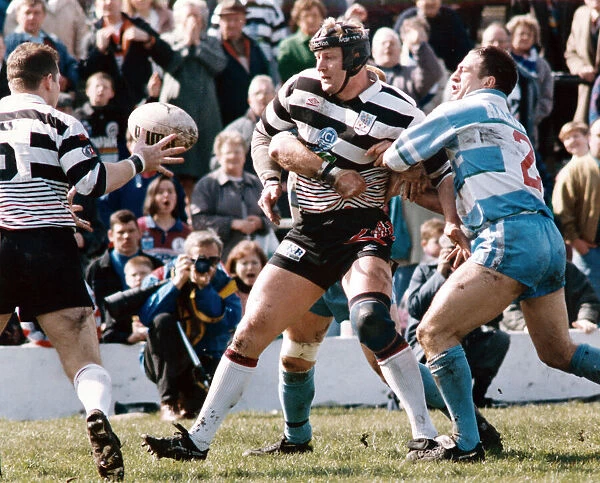 Widnes v Halifax Rugby League. Paul Moriarty takes the pressure
