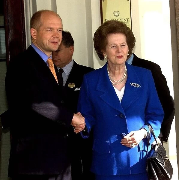 William Hague, Leader of the Conservative party stands alongside Lady Thatcher on her