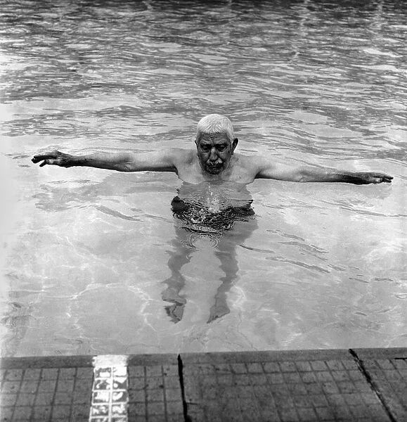 William Johnson 90 year old swimmer seen here taking exercise at his local pool