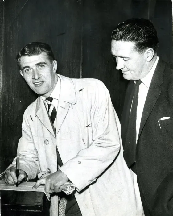 Framed Print : willie cunningham signs on for dunfermiline watched by manager jock stein sport football