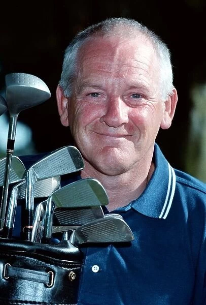 Willie Docherty June 1999 Kincardine golfer holding bag of golf clubs