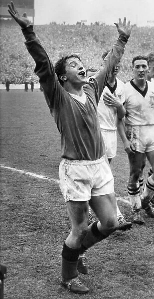 Willie Henderson of Rangers celebrates on the pitch at the end of