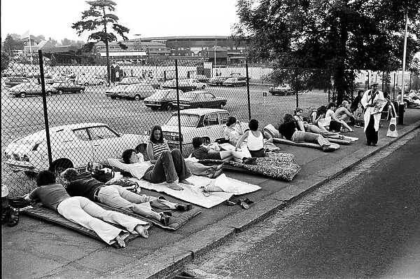 Wimbledon 1976. Fans queuing up outside. 1st July 1976