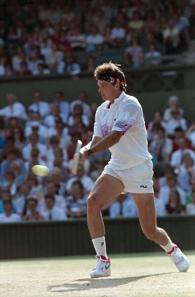 Wimbledon. Gabriella Sabatini, Andre Agassi, David Wheaton action. July 1991 91-4353-071