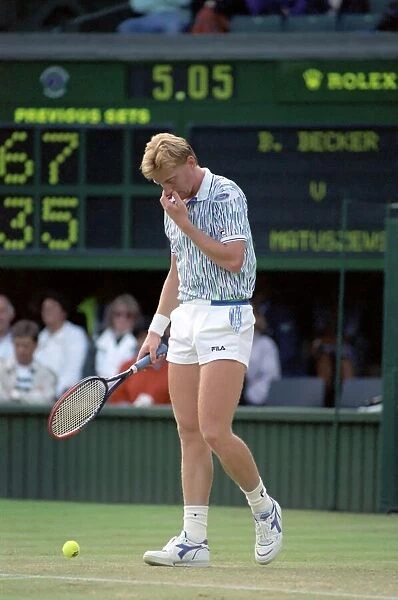 Wimbledon Tennis. Boris Becker Wearing Banned Shirt. June 1989 89-3895-031
