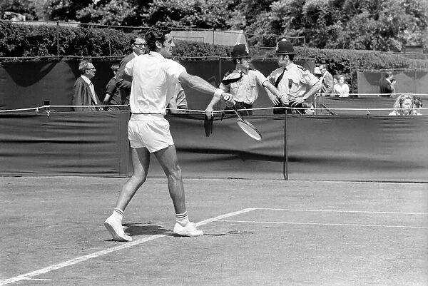 Wimbledon Tennis Championships 1970 1st Day. 2 policeman watch T. J