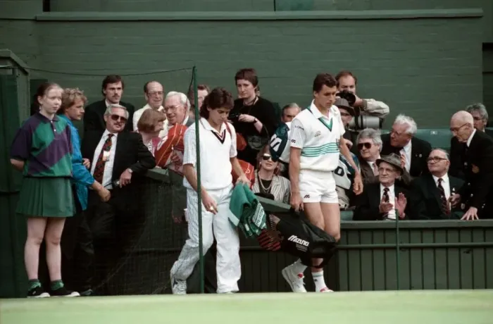 Framed Print : Wimbledon Tennis Championships. Ivan Lendl and Kelly Evernden walk out on court