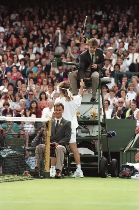 Framed Print : Wimbledon Tennis Championships. Andre Agassi shakes hands with the umpire Framed Print : Wimbledon Tennis Championships. Andre Agassi shakes hands with the umpire