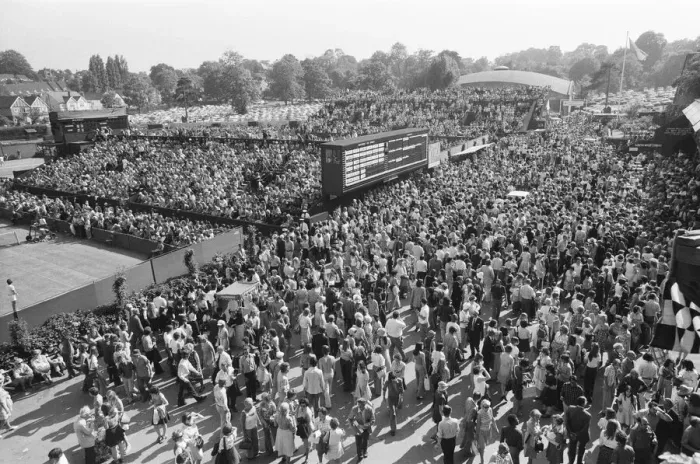 Framed Print : Wimbledon Tennis Championships. The huge crowd mill around the Tennis courts Framed Print : Wimbledon Tennis Championships. The huge crowd mill around the Tennis courts