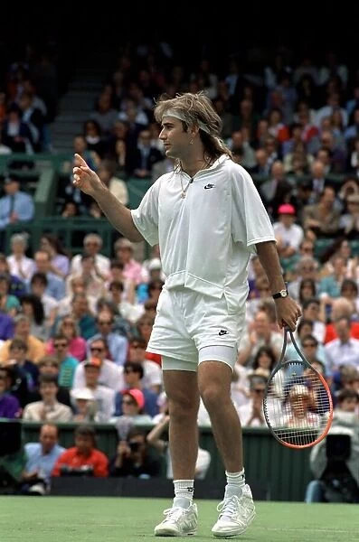 Wimbledon Tennis Championships. Andre Agassi in action. June 1991 91-4117-053