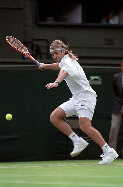 Wimbledon Tennis Championships. Andre Agassi in action. June 1991 91-4117-046
