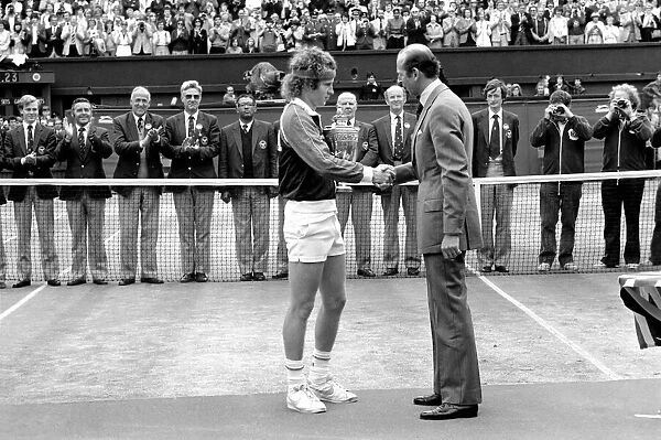 Wimbledon Tennis: Mens Finals 1981: John McEnroe is presented with the trophy