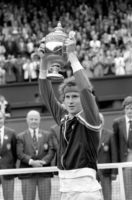Framed Print : Wimbledon Tennis: Mens Finals 1981: John McEnroe shows of the golden trophy to Framed Print : Wimbledon Tennis: Mens Finals 1981: John McEnroe shows of the golden trophy to