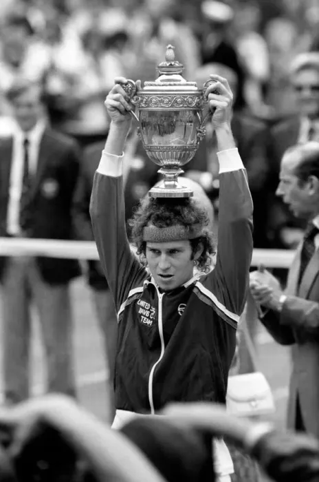 Framed Print : Wimbledon Tennis: Mens Finals 1981: John McEnroe shows of the golden trophy to