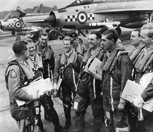 Wing commander Bryan Cox (left) commanding officer of 19 Lightning Squadron gives a final