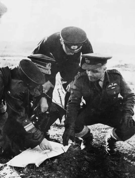 Framed Print : Wing commander G. R. Isherwood AFC and Russian air officers working out by chart details Framed Print : Wing commander G. R. Isherwood AFC and Russian air officers working out by chart details