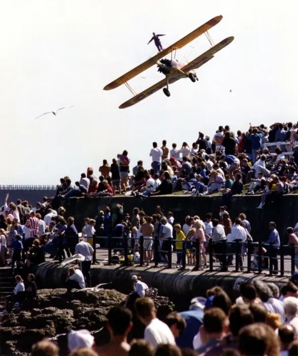 Framed Print : A wing walker performs on the Cadburys Crunchie Boeing-Stearman Model 75 biplane Framed Print : A wing walker performs on the Cadburys Crunchie Boeing-Stearman Model 75 biplane