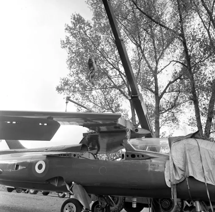 Framed Print : The wings being attached to a Folland Gnat of the Red Arrows in preparation for a Royal Framed Print : The wings being attached to a Folland Gnat of the Red Arrows in preparation for a Royal