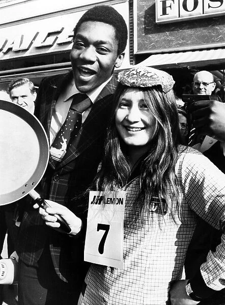 Winner if the Sandwell Mails pancake Day race, Diane Hadley, with comedian Lenny Henry