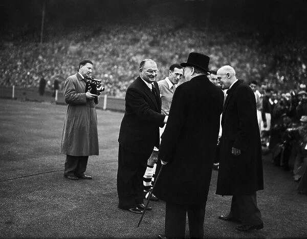 Winston Churchill attends the 1952 FA Cup Final at Wembley between Newcastle and Arsenal