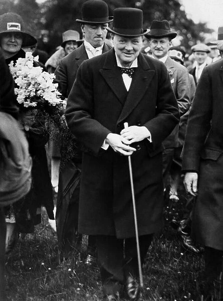 Winston Churchill in cheery mood on arrival at Hale Hall