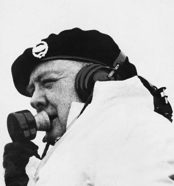 Winston Churchill in a Churchill tank, using a wireless telephone