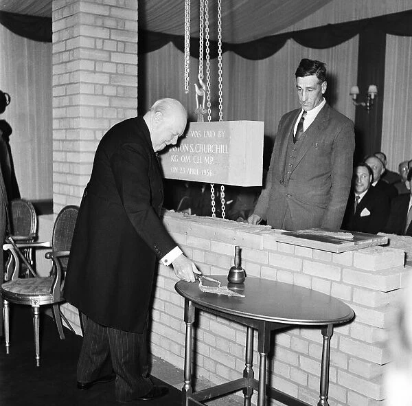 Winston Churchill lays the foundation stone at cornerstone laying ceremonies for a new