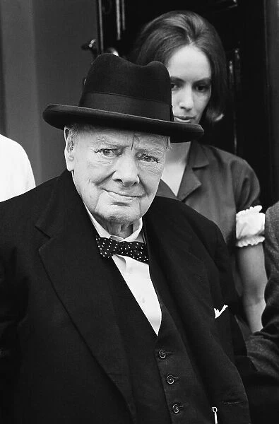 Winston Churchill leaves for the House of Comons for the last time as he retires as a